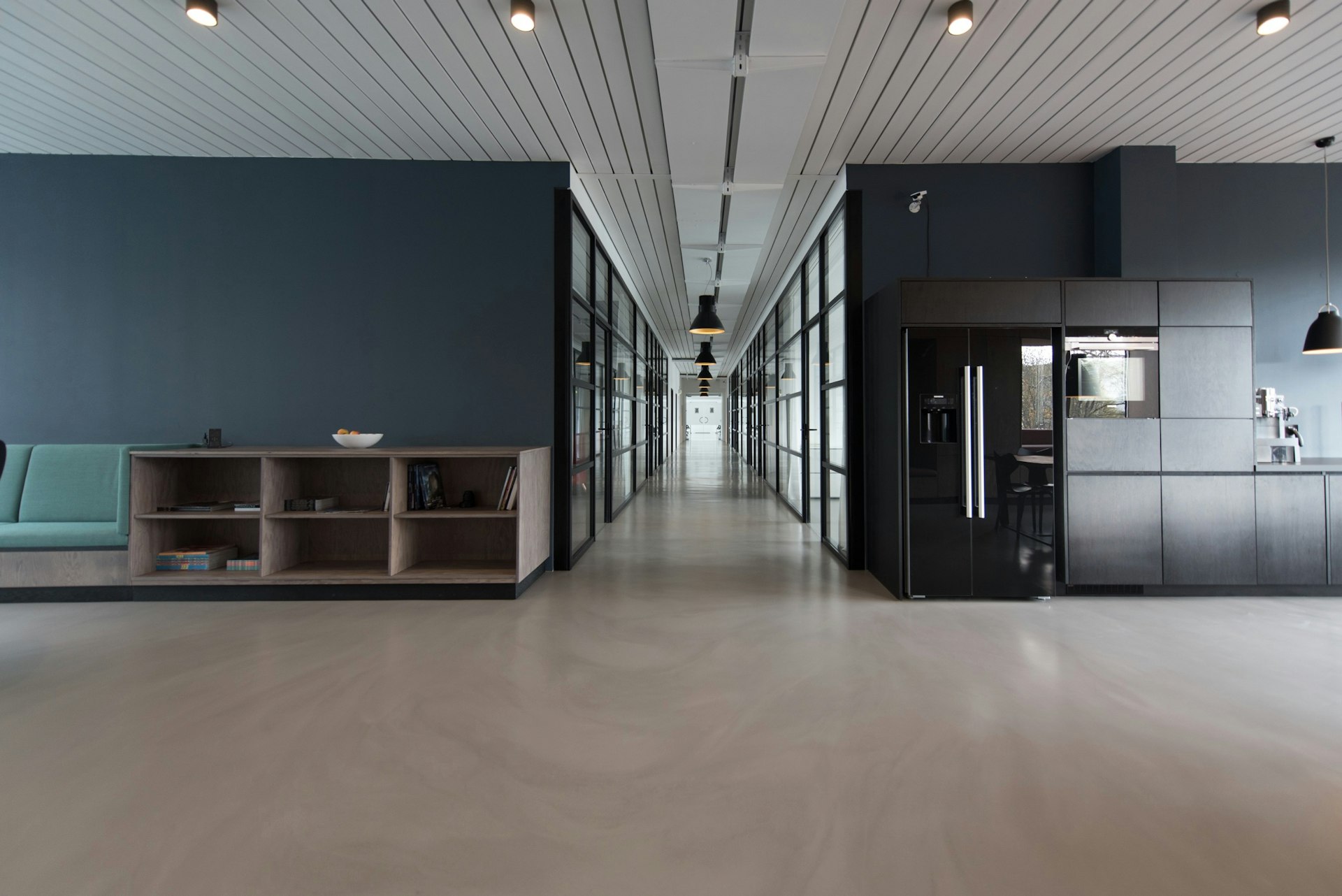 Modern corporate office interior with sophisticated design elements by SUA Interior Design